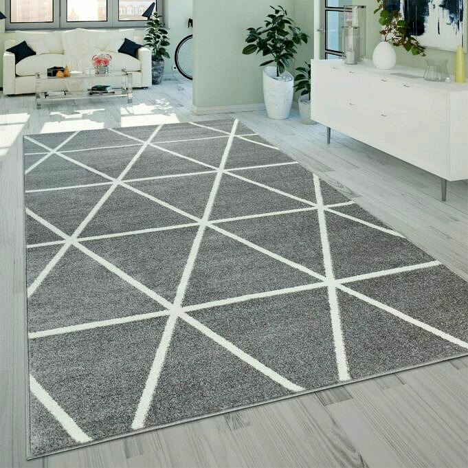 So Reinigen Sie Einen Teppich Auf Einem Holzboden